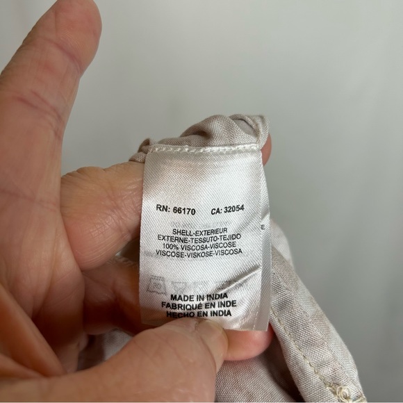 Ollari from Anthropologie cream animal print pull on pants high waisted - Picture 6 of 8